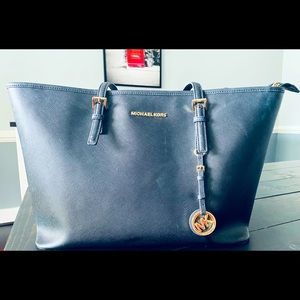 Michael Kors Black leather tote.